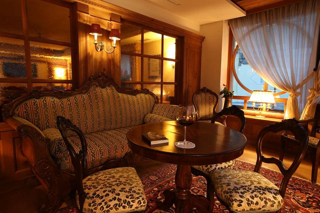 Alpen Suite Hotel Мадонна-ди-Кампильо Ресторан фото